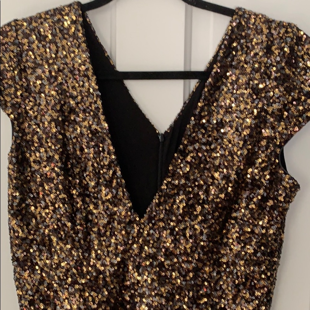 Black and gold sequin dress
